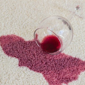 red wine spill on white carpet