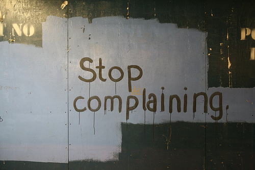 stop complaining sign