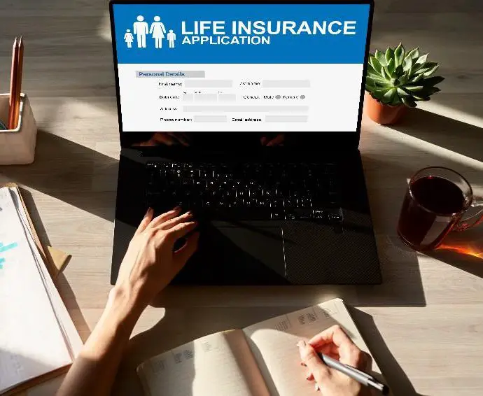 life insurance application on computer